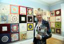 Organising artist Wendy Bliss with her Covid Chronicle tapestry exhibition at Chippenham Museum. Photo Trevor Porter.